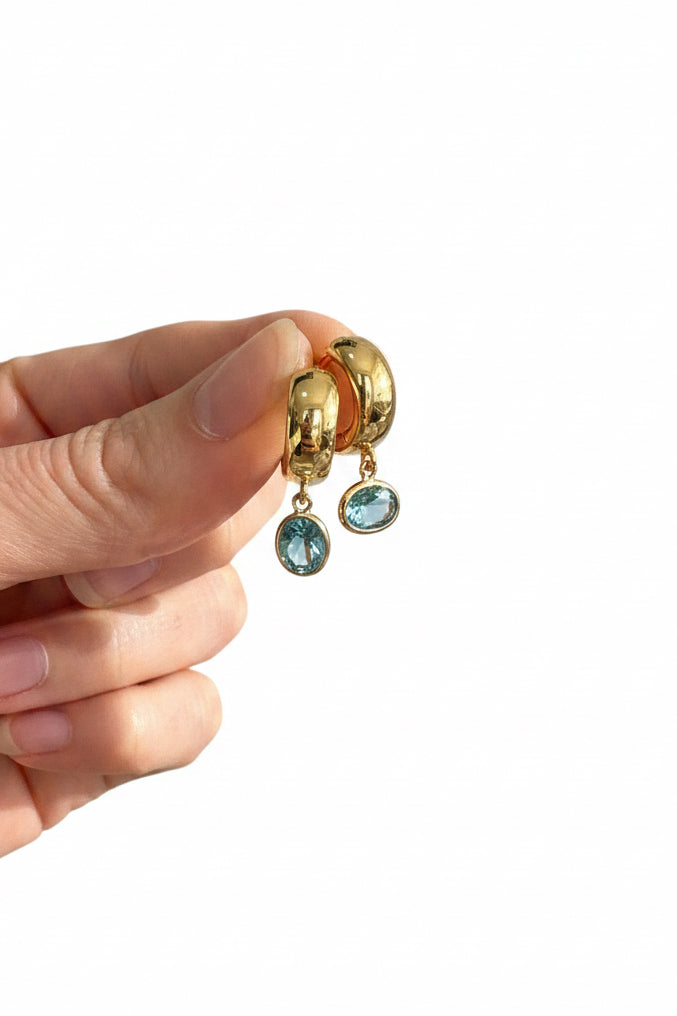 Aquamarine Droplets on Gold Huggies