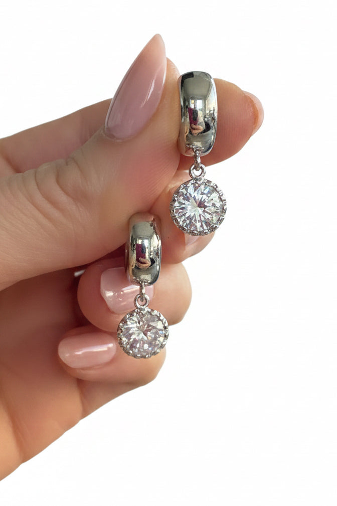 Sparkly rounds silver on Huggies