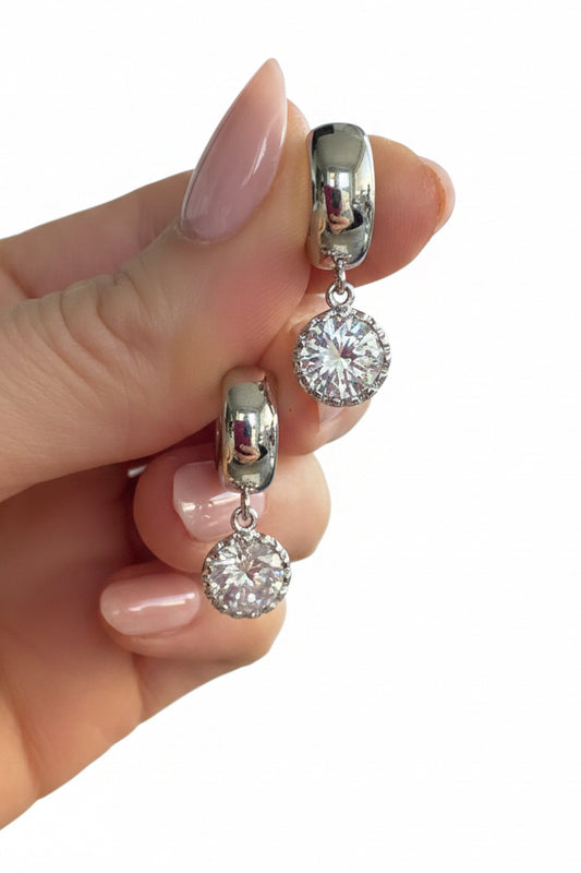 Sparkly rounds silver on Huggies
